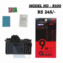 Canon R100 9H Tempered Glass Screen ProtectorModel R100 9H Tempered Glass Screen Protector for Canon EOS R100 with cleaning kitProduct box for Model R100 9H Tempered Glass Screen Protector with a Canon R100 camera showing the protector being applied. Includes cleaning wipes and a dust absorber.