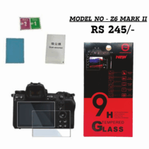 Close-up of a Nikon Z6 Mark II camera body with a clear tempered glass screen protector placed on its rear LCD. The image also displays the screen protector packaging, marked "MODEL NO - Z6 MARK II" and "RS 245/-", alongside cleaning accessories (wet/dry wipes, dust absorber, and microfiber cloth). The packaging highlights key features like 9H Hardness and Bubble-Free installation.