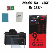 Close-up view of a camera screen protector kit, featuring a 9H Tempered Glass for a DSLR/Mirrorless camera (Model No - 1DX), priced at Rs 199. The image shows the glass protector on a camera, cleaning wipes, a dust absorber, and the red and black packaging highlighting features like 9H hardness, smudge proof, and bubble-free application.