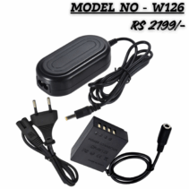 Black W126 Dummy Battery Charger Kit (Model CP-W126) for Fujifilm cameras, including a large AC power adapter brick, a detachable power cord with a European two-prong plug, and the DC coupler (dummy battery) with an attached coiled cable. The text overlays the image, stating "MODEL NO - W126" and "RS 2199/-".