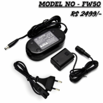 "Model FW50 USB Dummy Battery Charger Kit (RS 2499/-) featuring a DC Coupler, AC Power Adapter (AC-FW50 model), and power cable for continuous camera power supply."