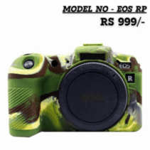 Close-up of a Canon EOS RP camera fitted with a green and brown camouflage patterned silicone rubber cover, showing the front view with a black lens cap attached.