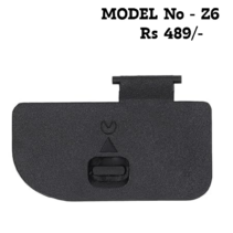 Replacement battery door cover for Nikon Z6 and Z7 mirrorless cameras, black battery chamber lid repair part.