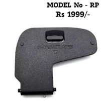 "Replacement battery door cover for Canon EOS RP mirrorless camera, black plastic battery compartment lid."