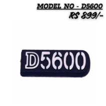"Replacement Nikon D5600 camera body nameplate logo badge in black with white lettering, shown with price Rs 899."
