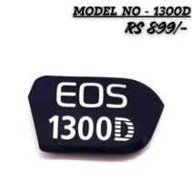 "Replacement PICO nameplate logo for Canon EOS 1300D DSLR camera body, featuring white 'EOS 1300D' text on a black background, used for camera repair and restoration."