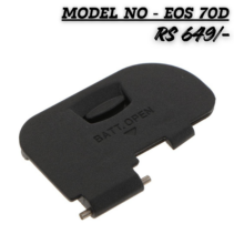 "Replacement Battery Door Cover for Canon EOS 70D DSLR camera showing 'BATT. OPEN' text and metal hinge pins on a white background."