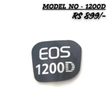 "A close-up of a black rectangular Canon EOS 1200D replacement nameplate badge with white lettering."