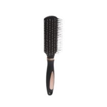 Professional matte black and rose gold paddle hair brush shown next to a woman with voluminous, styled wavy hair.