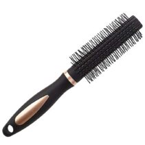 Professional ceramic radial hair brush in rose gold and black next to a woman with smooth, shiny brunette hair after a blowout.