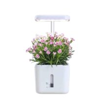White LED Smart Planter with adjustable grow light and 0.7L self-watering reservoir, showing the retail packaging and telescopic pole.